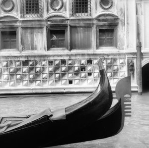 Step gondola in a Venetian Canal