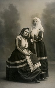 Two women wearing traditional costumes, Fonni, Sardinia, Italy, circa 1915 by Italian Photographer