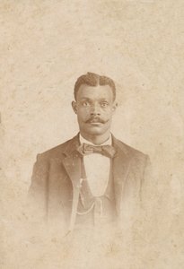 Photograph of a Man in a Suit, Vest and Necktie