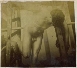 Study of a Male Nude Model, Leaning Forward in a Wooden Structure, in the Studio of Jacques de Lalaing by Jacques Lalaing (attributed to)