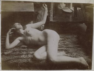 Study of a Female Nude Model, Lying on a Tiger Skin, in the Studio of Jacques de Lalaing by Jacques Lalaing (attributed to)