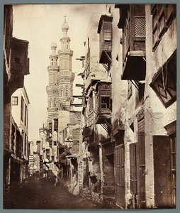 Egypt. Cairo. Alley - in the background minarets of the Mamluk mosque Al-Mu