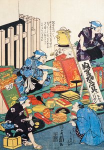 Stand with boxes, fans, books and kakemonos