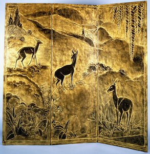 A Three-Fold Lacquer Screen, Depicting Deer in a Landscape of Hills by Jean Dunand