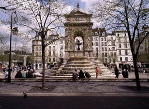Fountain of the Innocents in Paris by Jean and Lescot Pierre Goujon