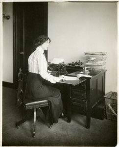 Model with typewriter, c.1905-18 by Jessie Tarbox Beals
