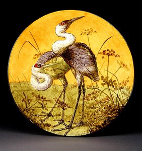 Charger depicting two cranes by John Bennett
