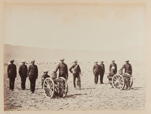 A group of soldiers with two Gatling guns