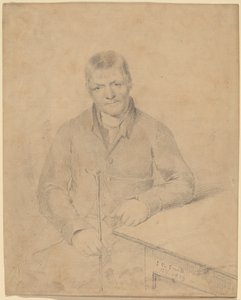 Man Seated at a Table
