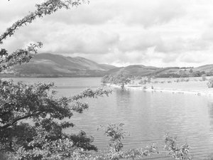 A view across Crummock Water with fells in the background