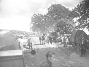 Horses Being Led Down Road at Appleby with Caravans and Cars on the Verges