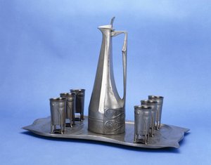 An Edelzinn Eight Piece Pewter Liquor Set by Joseph Maria Olbrich