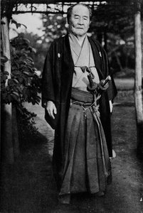 Viscount Shibusawa, 1840-1931 wearing his samurai swords