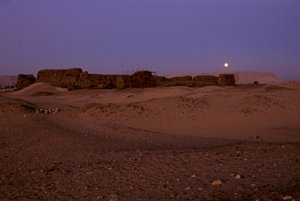 Full moon setting over Shunet of Khasekhemuy, Abydos, Egypt
