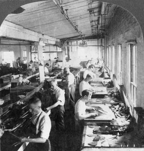 Workers Cutting Leather for Shoes in a Factory, Lynn, Massachusetts, USA