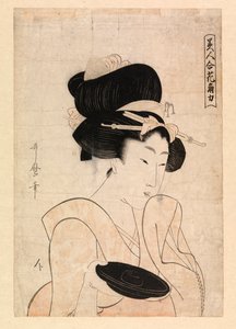 Courtesan holding a sake cup by Kitagawa Utamaro