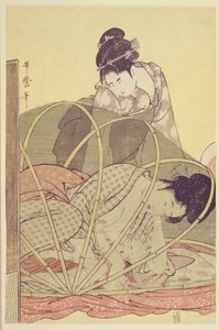 Mother Nursing Baby under Mosquito Net