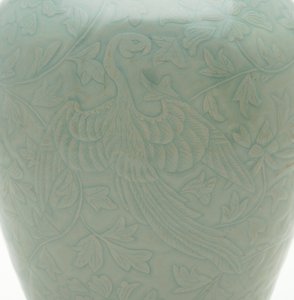 Bottle with Carved and Incised Design of Two Phoenixes and Peony Vinescrolls