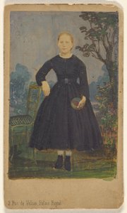 Unidentified Young Woman Standing, Holding a Ball