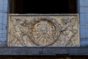 Balustrade Plate with Rayed Sun in Garland, Bas-Relief on Facade of San Sebastiano Church
