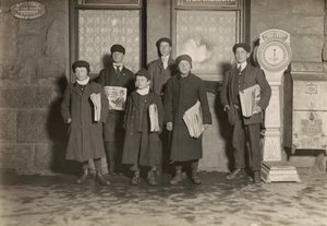 8:30 P.M. Group of Newsboys Selling at Depot, Hartford, Connecticut, March 1909 by Lewis Wickes Hine