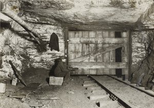 Boy Waiting for Coal to Come Through