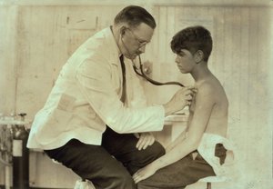 Doctor Examining Young Mill Worker, Cheney Silk Mills, South Manchester, Connecticut by Lewis Wickes Hine