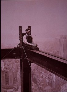 Empire State Building under construction, showing workman taking a break