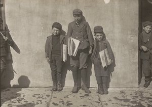 John Pento, 14 years old, Daniel and Angelo Pento, 7 years old, selling newspapers by Lewis Wickes Hine