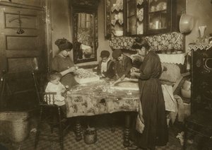 Mrs. Mette and Her Children Making Flowers in a Dirty New York Tenement, 1911 by Lewis Wickes Hine