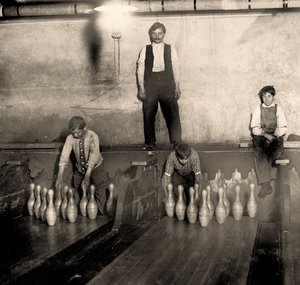 Pinboys in a Subway bowling alley, 65 South Street, Brooklyn. New York. 1910