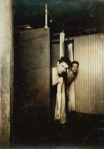 Telegraph boys using shower baths, Postal Tel. Co., Broadway, New York, 1910