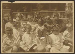 Group of Children in Front of Porch