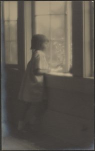 Little Girl Looking Out Window