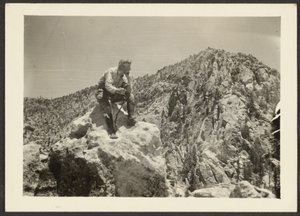 Man Atop Rocks by Louis Fleckenstein