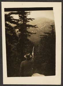 Man Pointing with a Stick