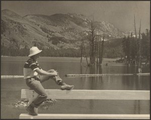 Man Sitting on Bench at Lake Side by Louis Fleckenstein
