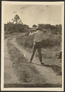 Man on Trail with Gun