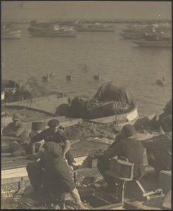 Men Seated in Boats