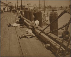 Men Seated on Dock by Louis Fleckenstein