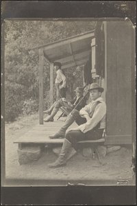 Men Sitting on a Porch by Louis Fleckenstein