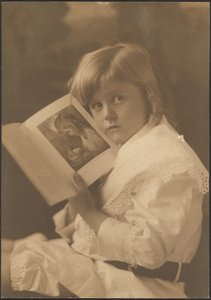 Portrait of Child Holding Book Open to Illustration by Louis Fleckenstein