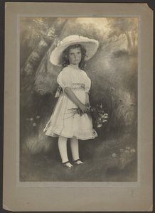 Portrait of a Girl with Flowers before Painted Backdrop by Louis Fleckenstein