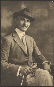 Portrait of a Man Holding Cane and Gloves by Louis Fleckenstein