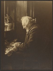 Portrait of a Man Working at Desk
