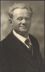 Portrait of a Man in Black Striped Suit