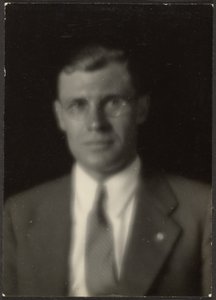 Portrait of a Man with Glasses and Lapel Pin by Louis Fleckenstein