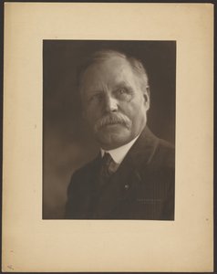 Portrait of a Man with Metal Lapel Pin
