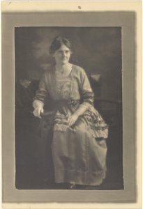 Portrait of a Seated Woman in Dress with Ribbon Accents by Louis Fleckenstein