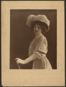 Portrait of a Woman Standing with Umbrella by Louis Fleckenstein